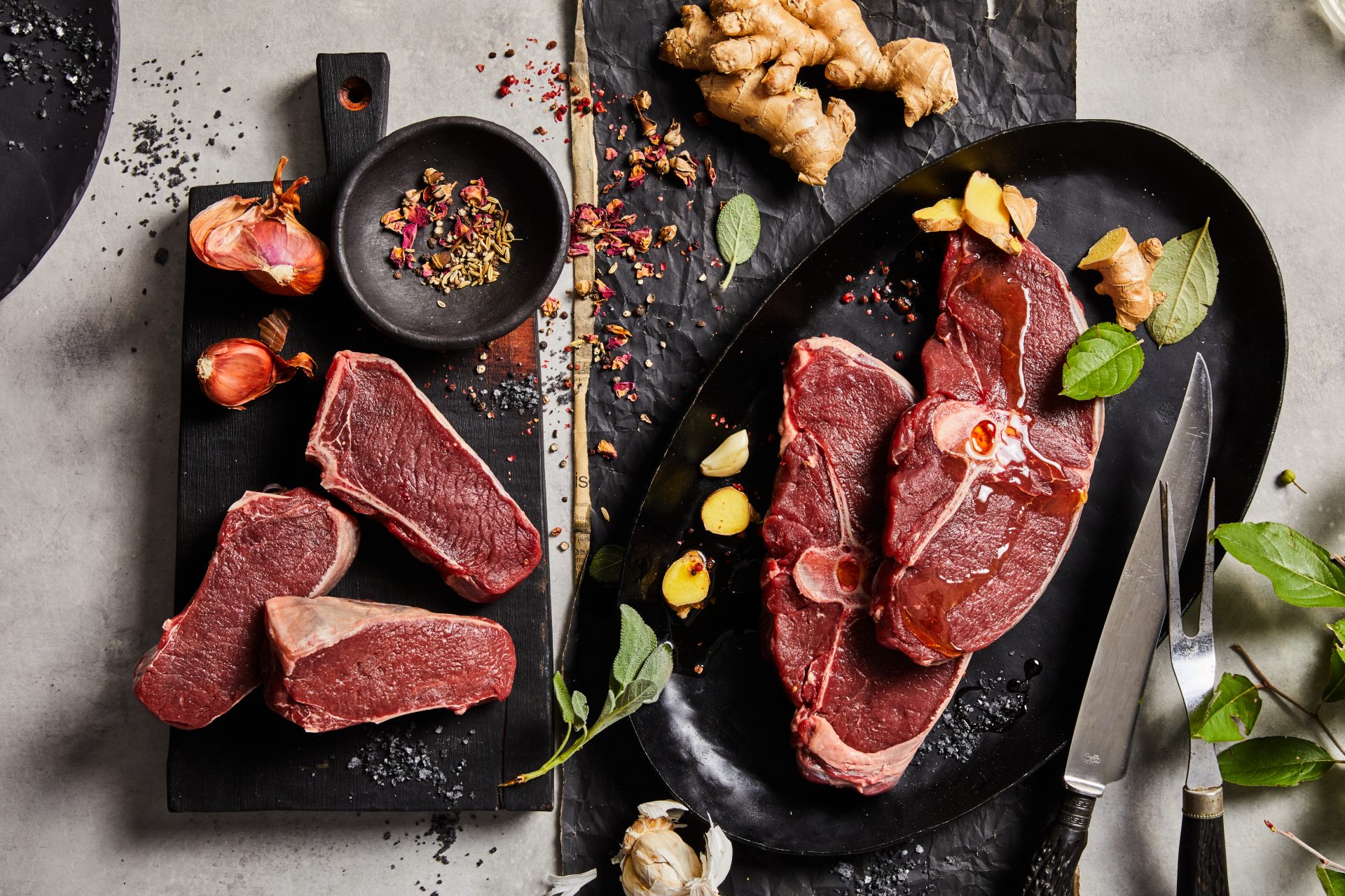 Maui Nui loin and leg cuts on black plates