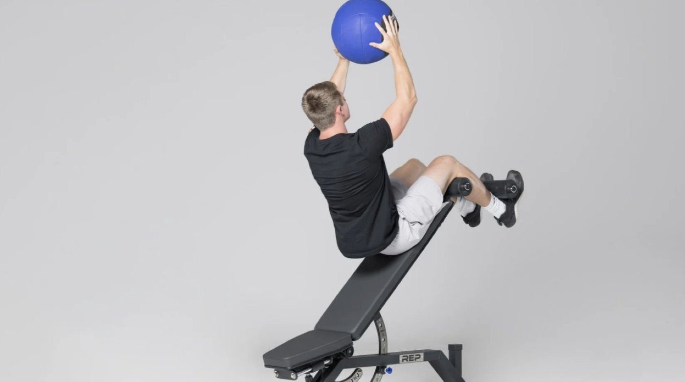 Rep Fitness Sit up exercise with blue medicine ball 2