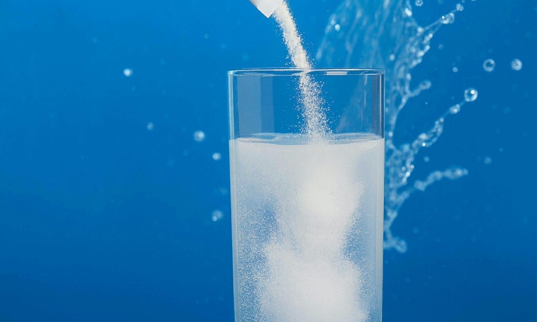 collagen powder packet glass of water
