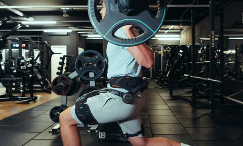 A man lunging with a Hypershell Exoskeleton on