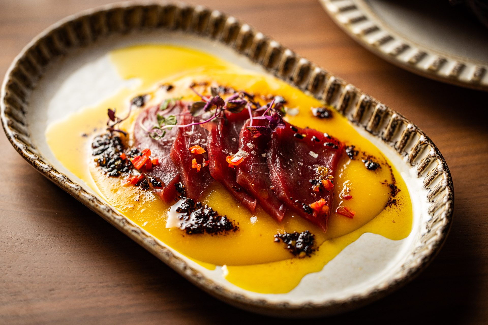 Amasa tuna crudo on plate