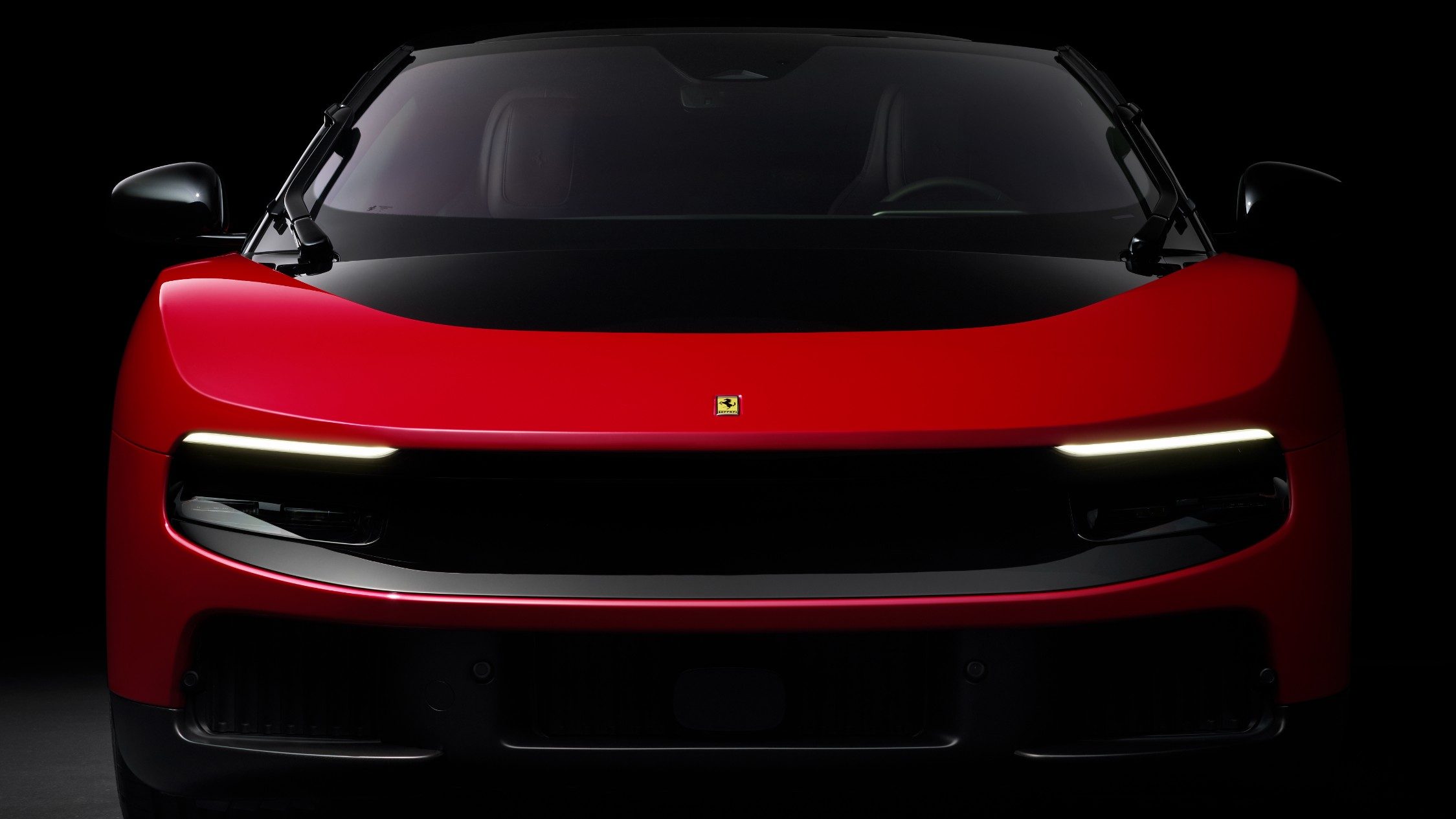 The front of a red Ferrari Luce