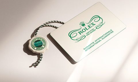 Rolex Certified Pre-Owned card showing official authentication for a used Rolex watch