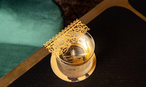 Gold Zari cocktail on table