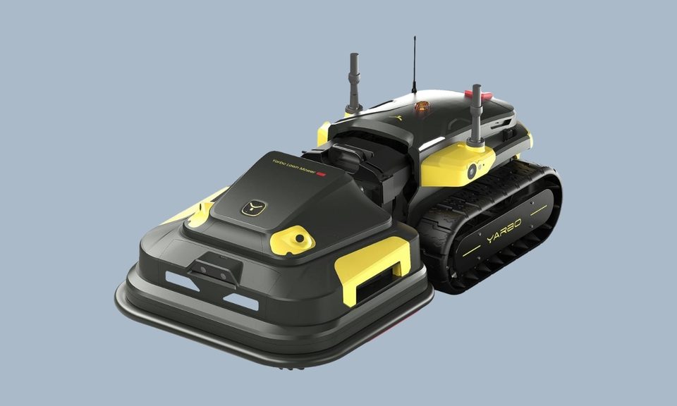 Yarbo black and yellow robot lawn mower against a plain gray background