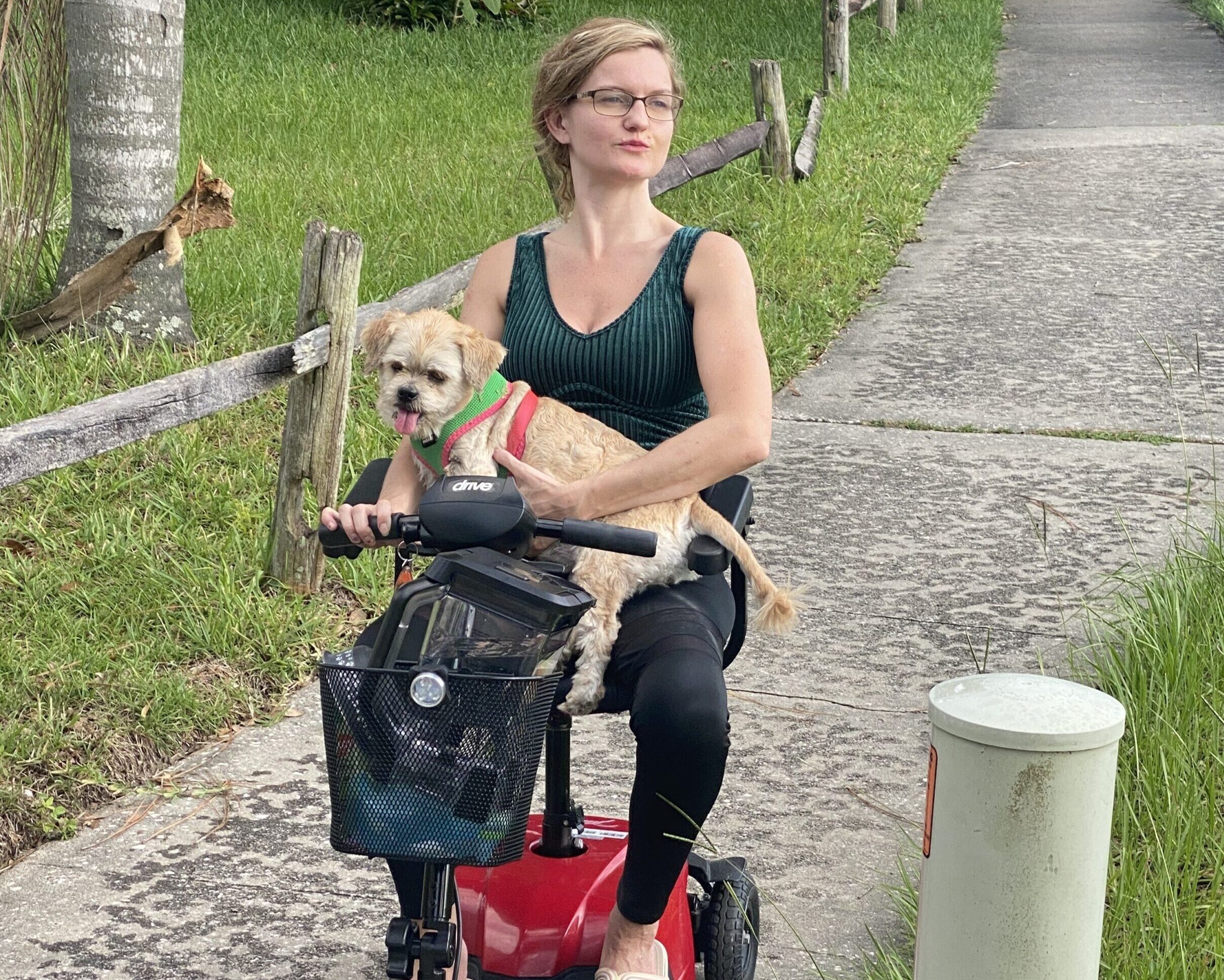 Steph and JJ on the scooter power chair