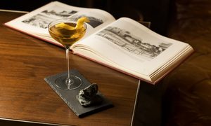 a cocktail at library bar in toronto