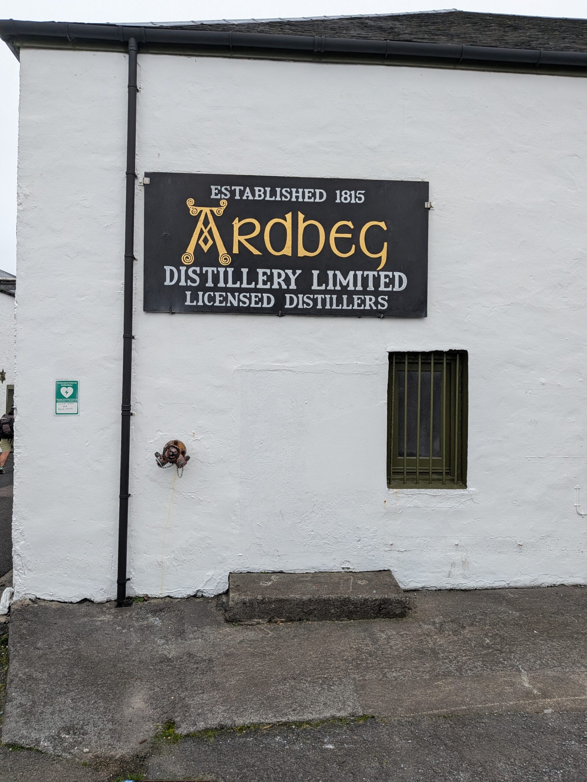 Sign, building, distillery