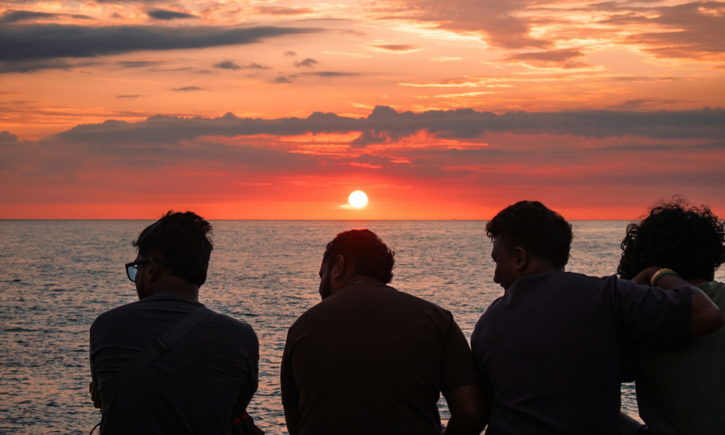 friends men support sunset happy
