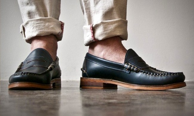 A pair of navy Loafers with chinos