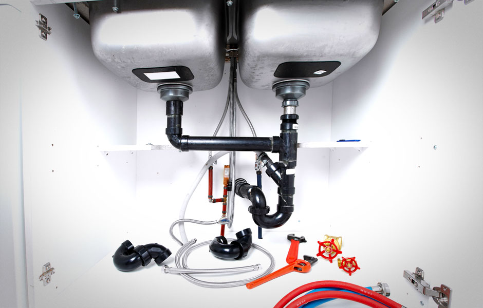 The underside of a kitchen sink