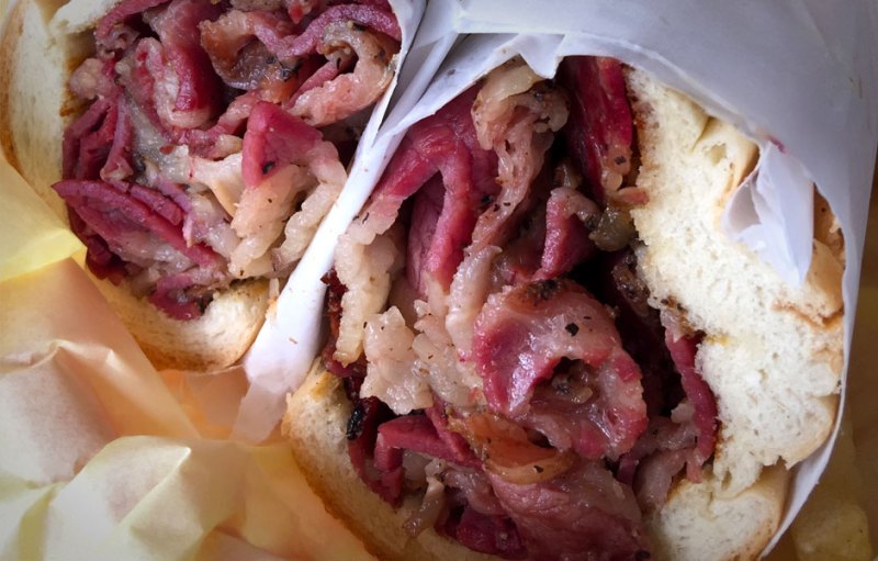 oinkster pastrami sandwich on french bread roll