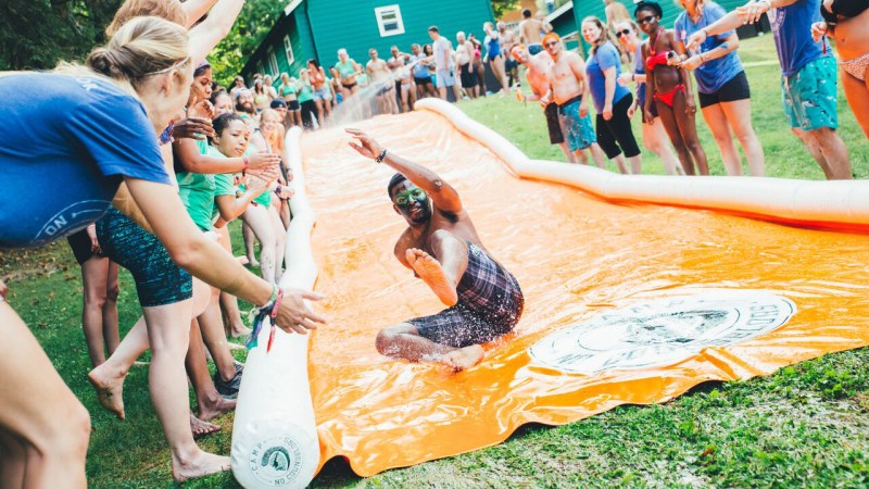 Camp No Counselors People Using a Waterslide