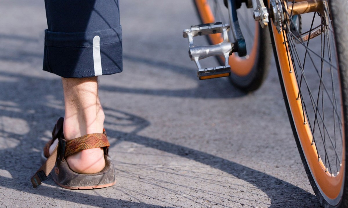 commuter pant, mountain khakis, rolled up pant leg on bicycle