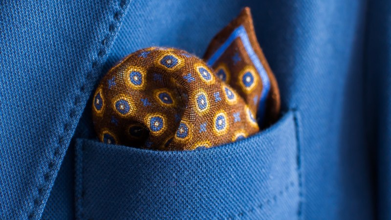 how to fold a pocket square, paisley pocket square in blue jacket pocket