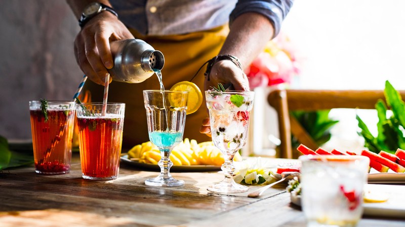 Man preparing quick cocktails at home