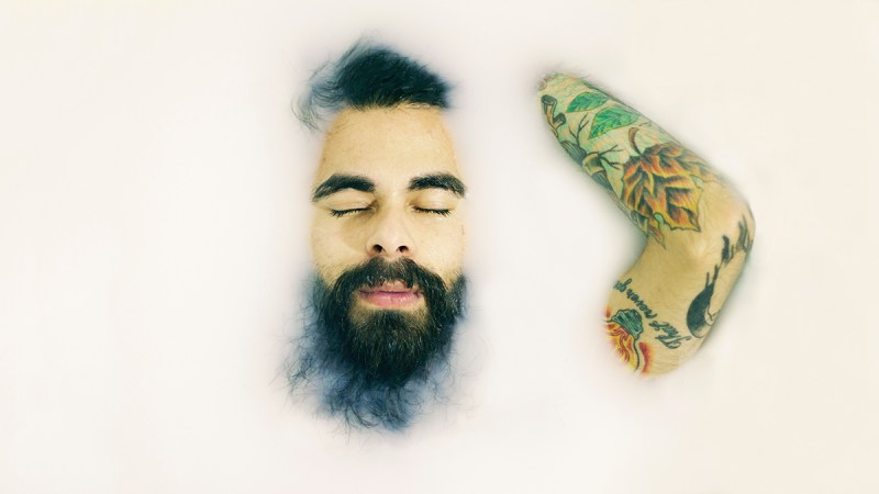 man taking a bath with natural body wash