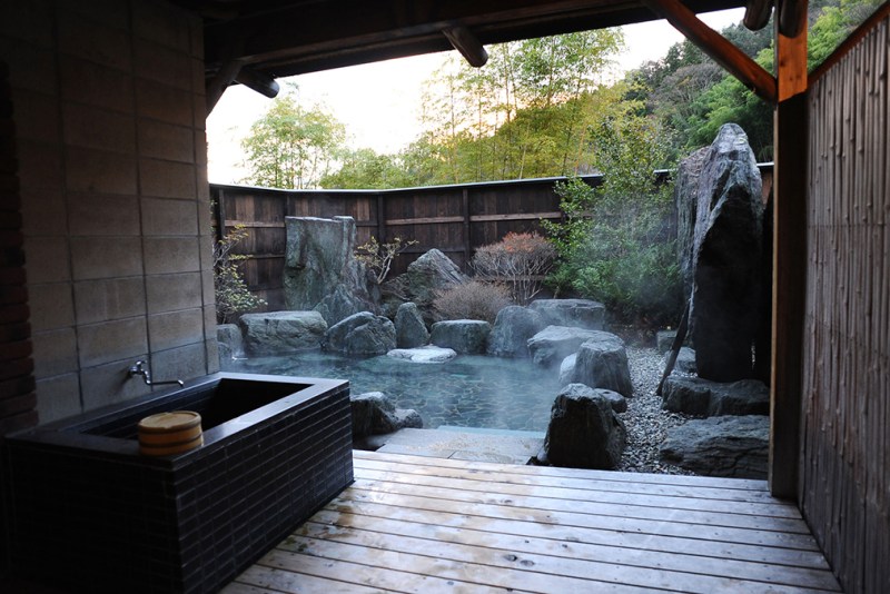 An upscale Japanese onsen with an outdoor Zen area.