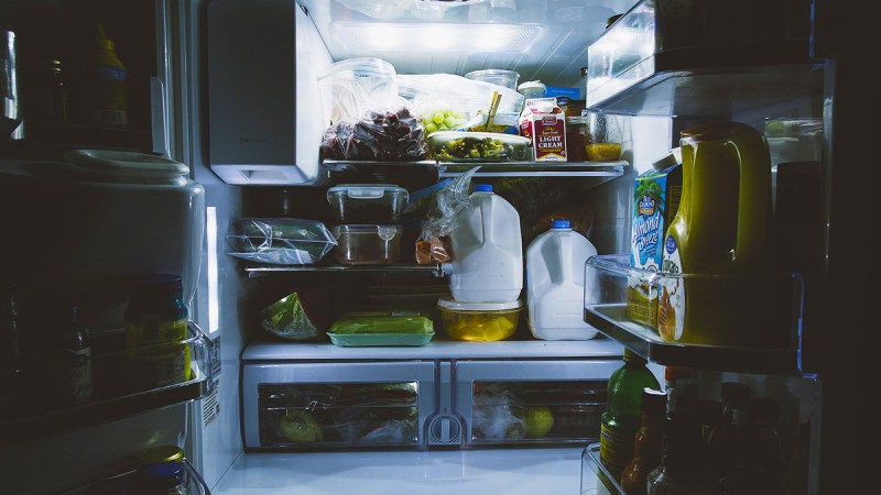 messy fridge that needs to be cleaned