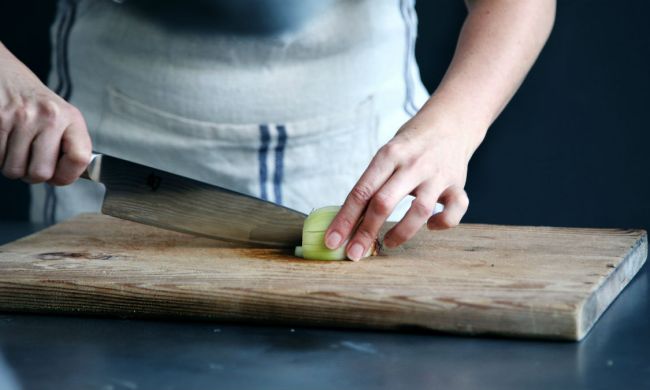 Person using a chef's knife