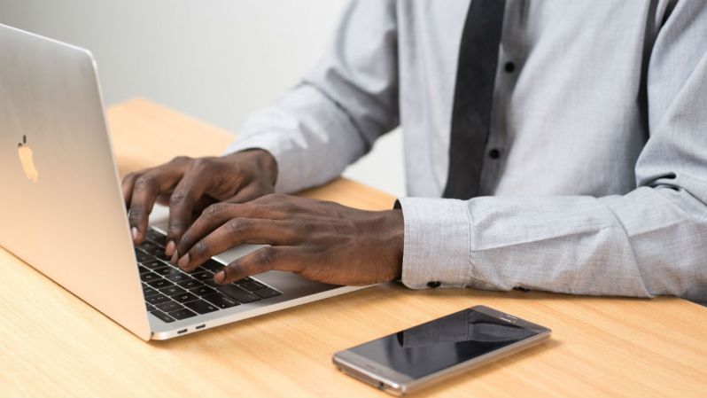 man computer laptop phone