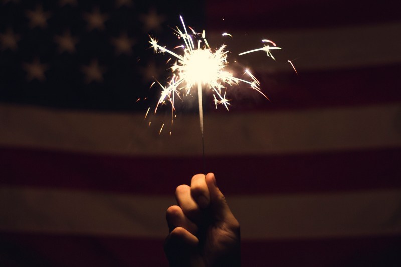 Fourth of July Sparkler and American Flag.