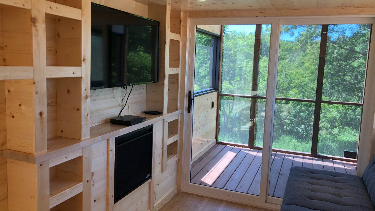 escape tiny house travel home with porch 1