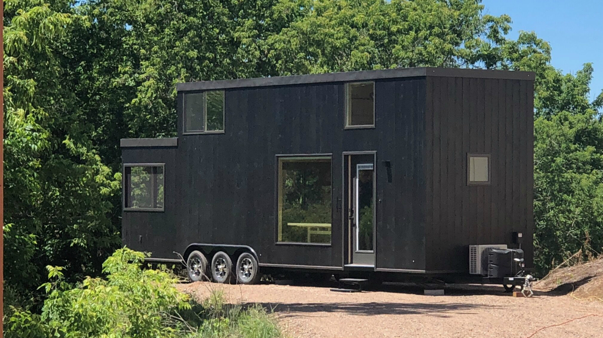 escape tiny house travel home with porch 3