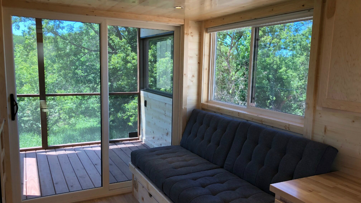 escape tiny house travel home with porch 4