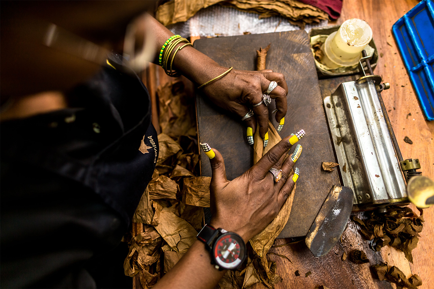 A worker makes Cohiba cigars
