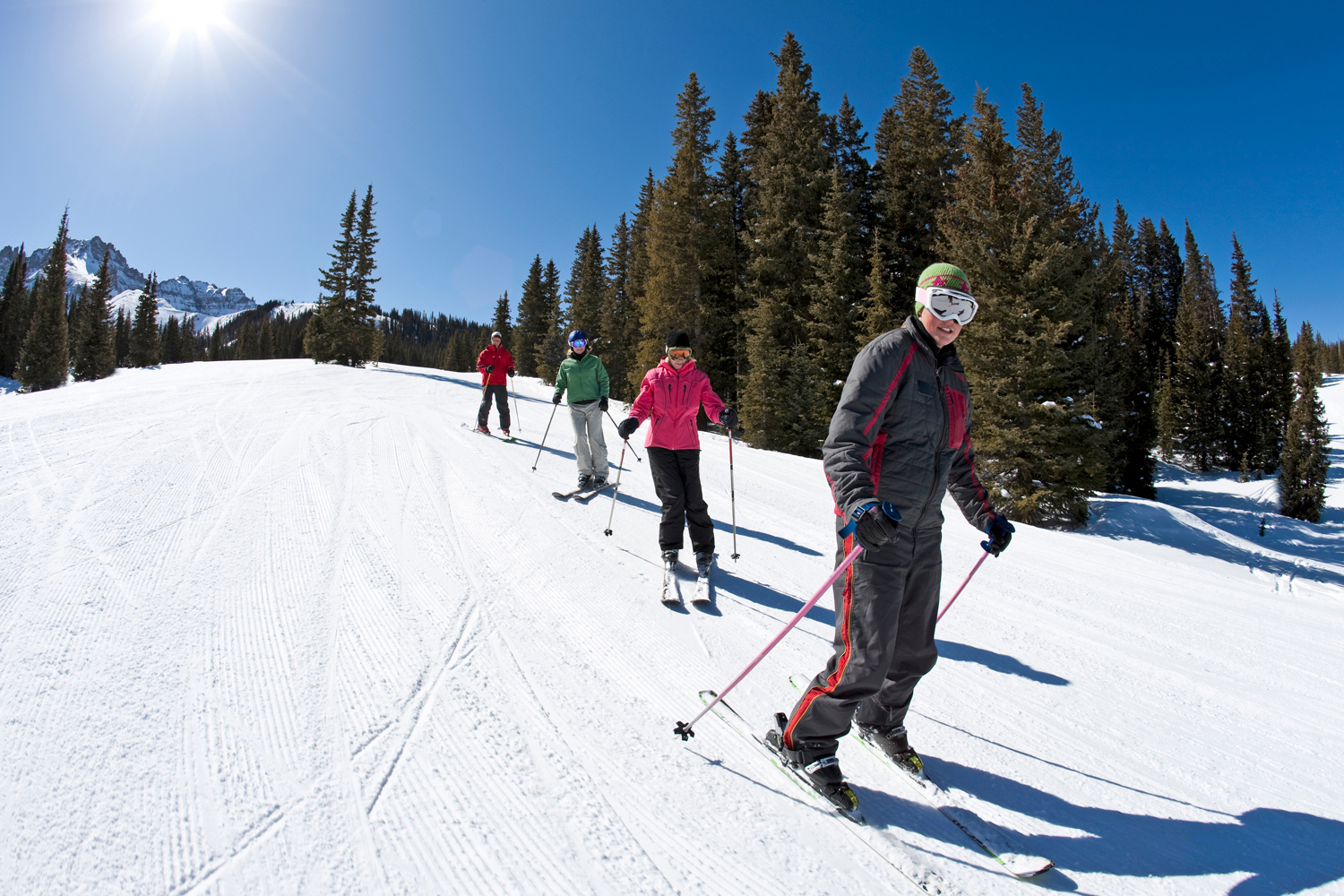 Group of skiiers learning to sk