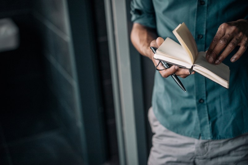 Man with a journal