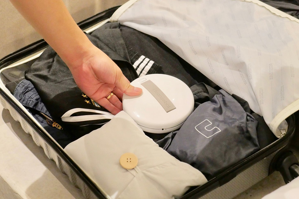 cleansebot is a pocket sized bacteria killing robot for germaphobe travelers travel luggage