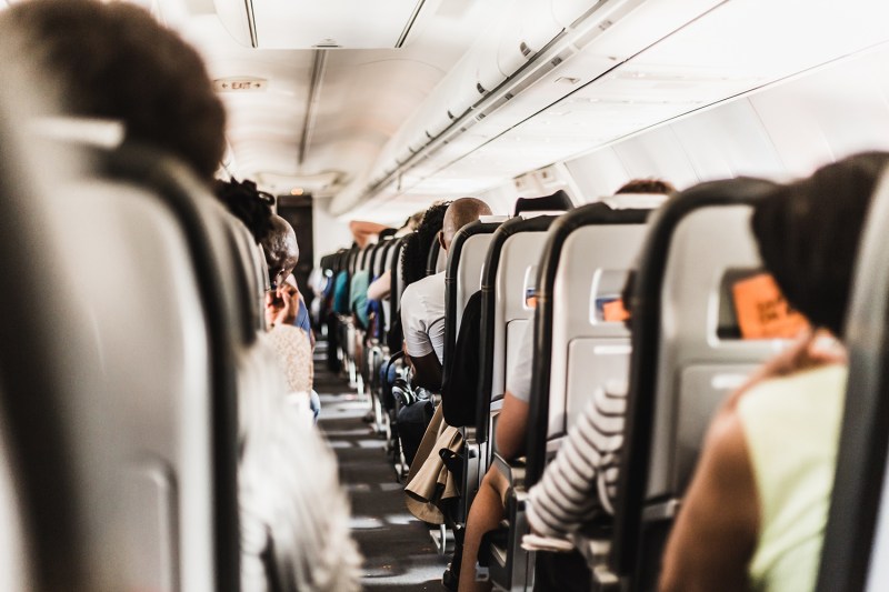 airplane flight aisle passengers