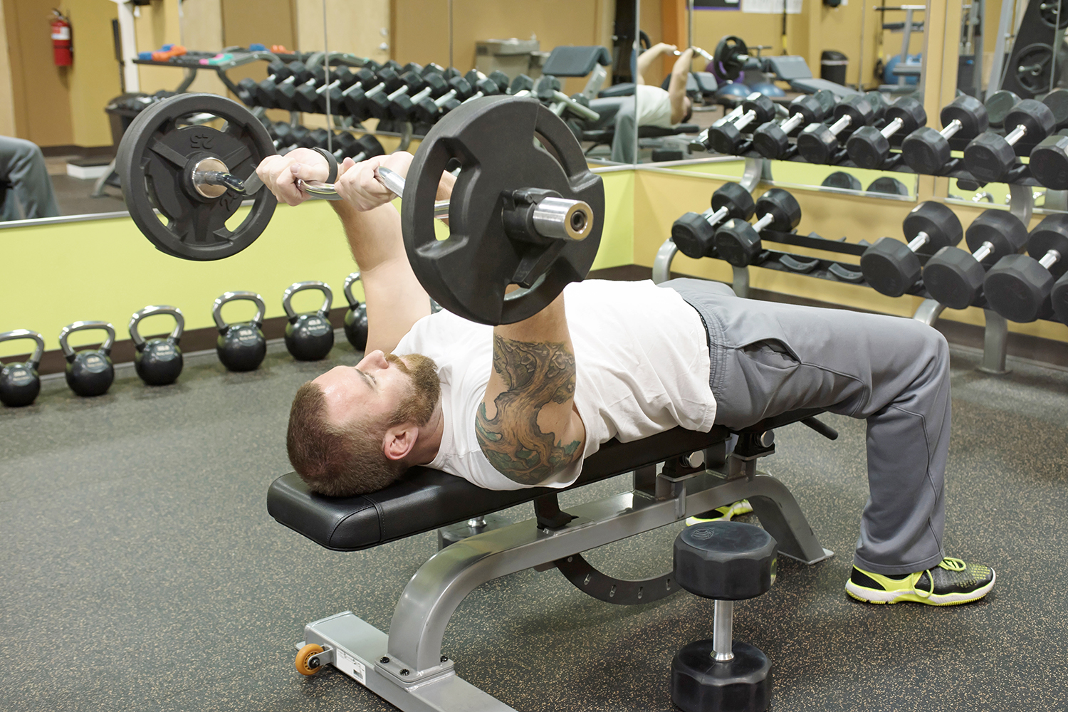 Man doing bench presses