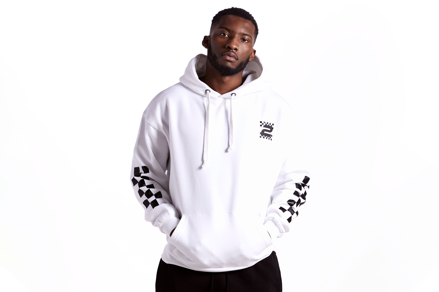 idris elba debuts new 2hr set fashion line inspired by dj culture chequered print hoodie white