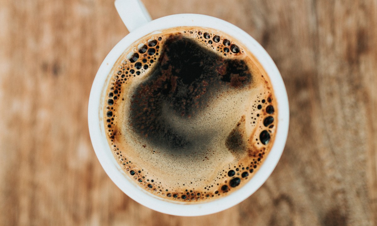 A cup of coffee photographed from above.