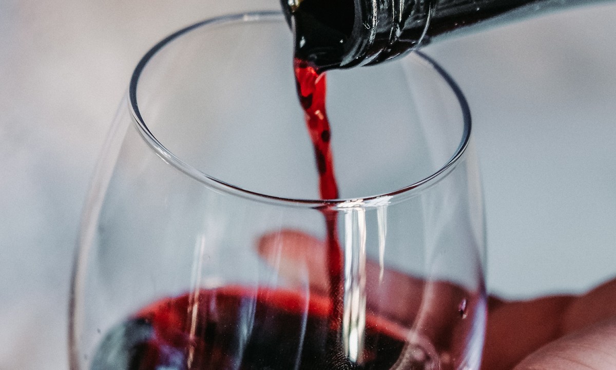 A red wine glass and wine