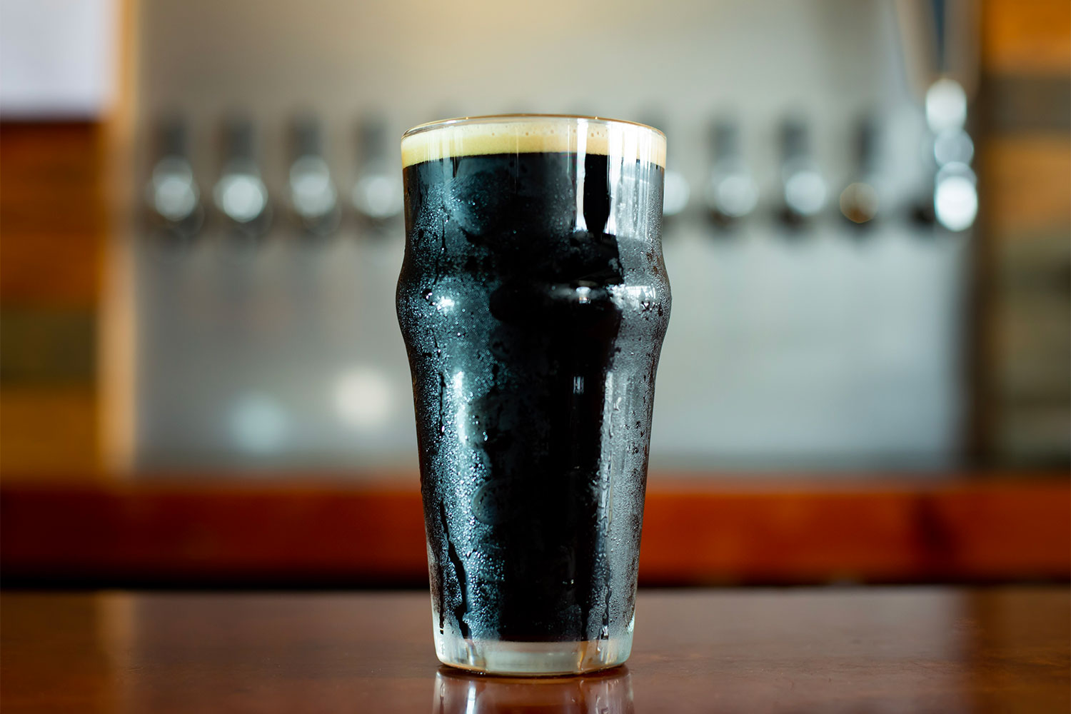 A pint of stout at the bar