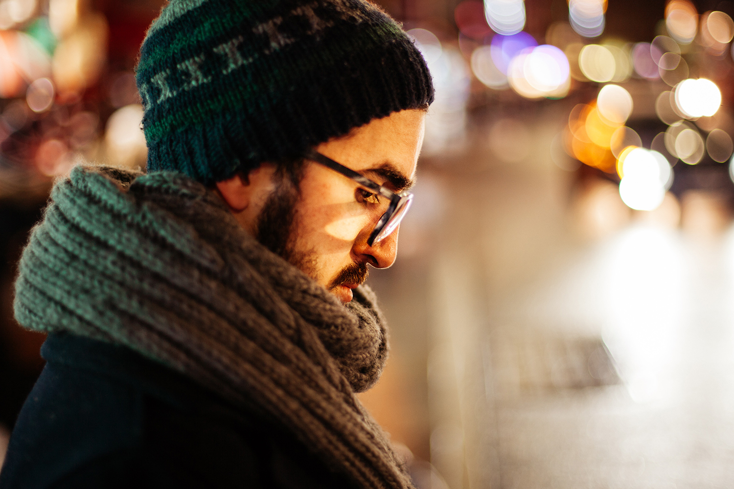 Man wearing a scarf and beanie