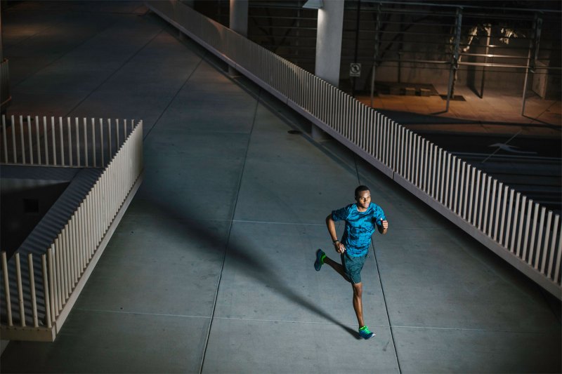 A man running at night.