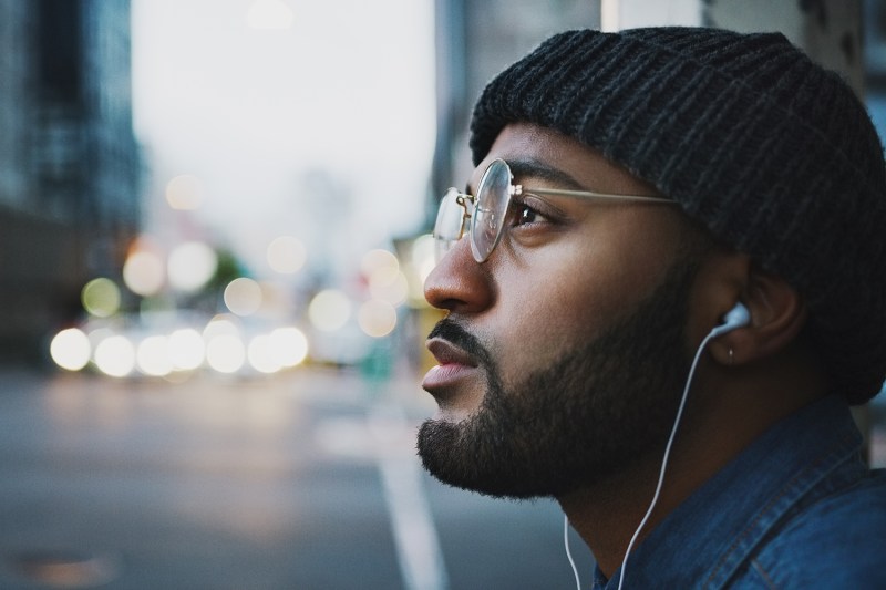 man listening to music headphones