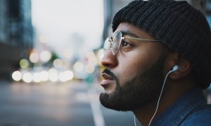 man listening to music headphones