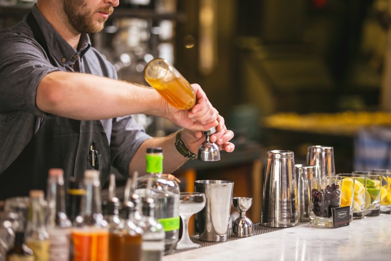 Making cocktails at a bar