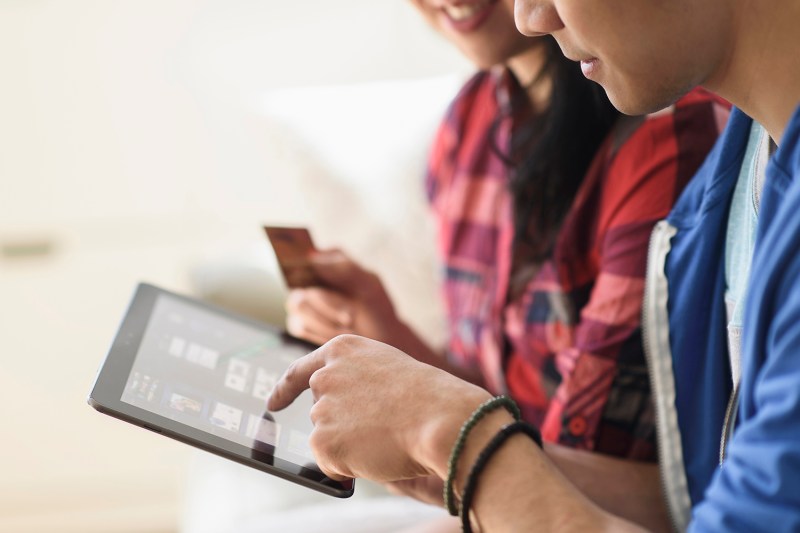 A couple ordering a product online.