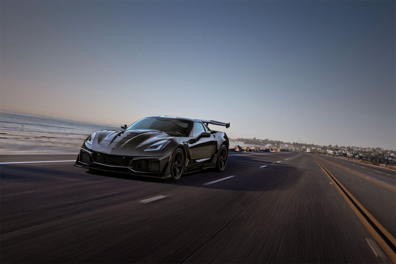 Chevrolet Corvette ZR1 front end angle from driver's side driving down the road.