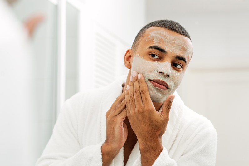 Man Treating Acne Scars