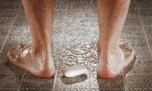 Man washing his feet.