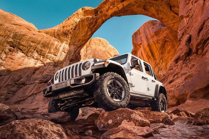 Jeep Wrangler Rubicon on a red rock trail.