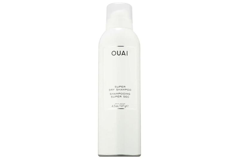 A bottle of Ouai Super Dry Shampoo on white background.